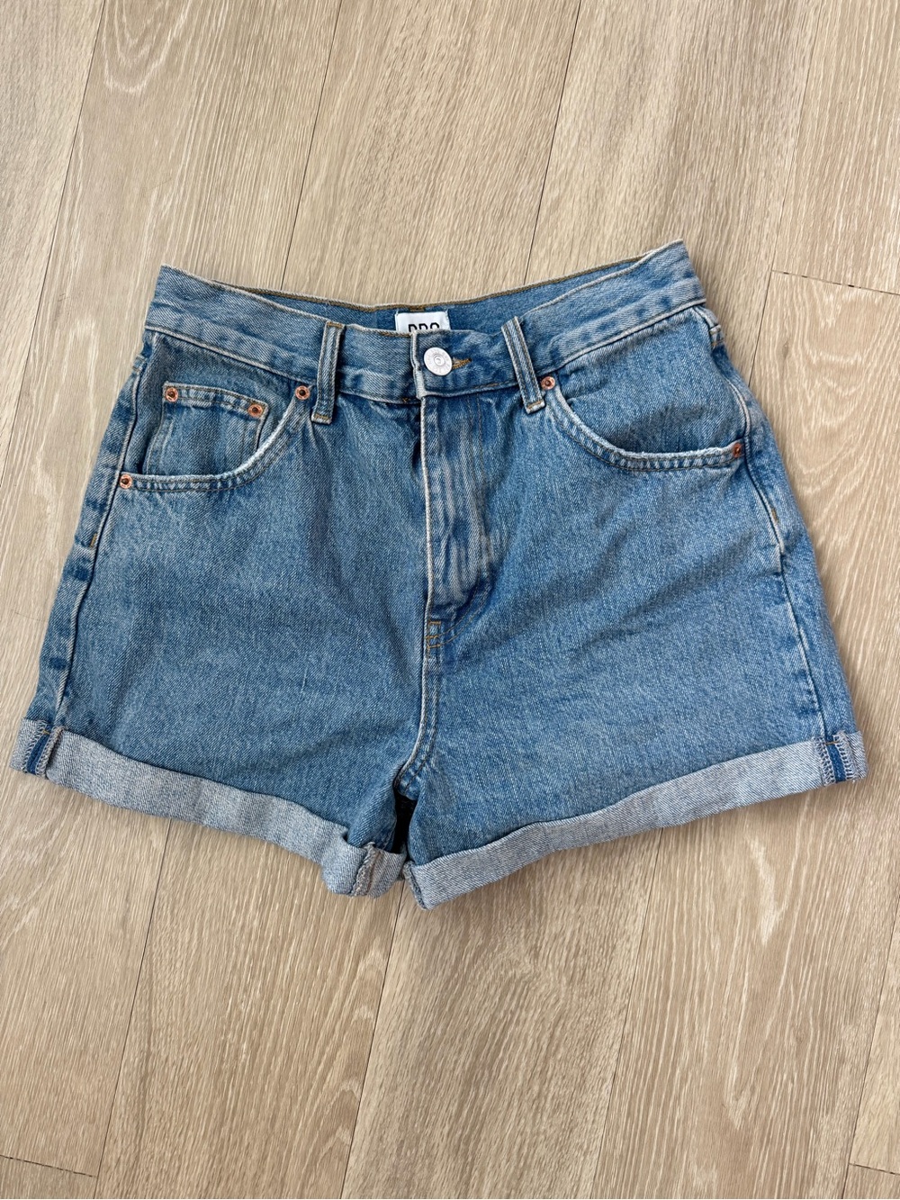 BDG Rolled-Hem Denim Shorts in Light Blue